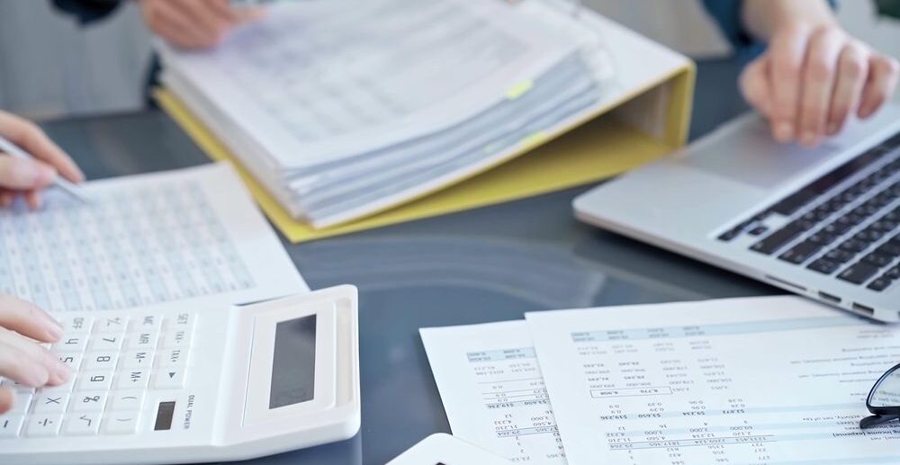 Business,Colleagues,Reviewing,Financial,Documents,And,Calculating,Taxes.,Auditor,Inspecting Business,Colleagues,Reviewing,Financial,Documents,And,Calculating,Taxes.,Auditor,Inspecting